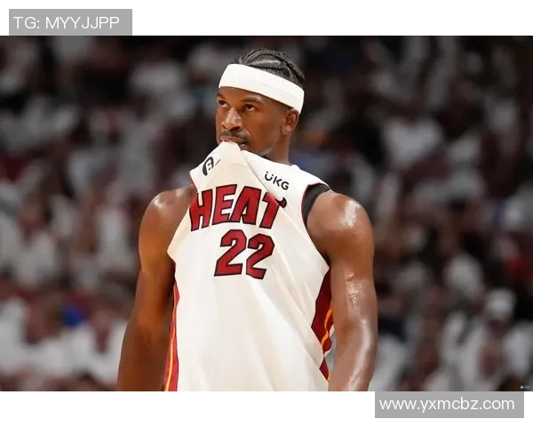 吉米巴特勒领衔热火队奋战季后赛展现领袖风范与不屈精神